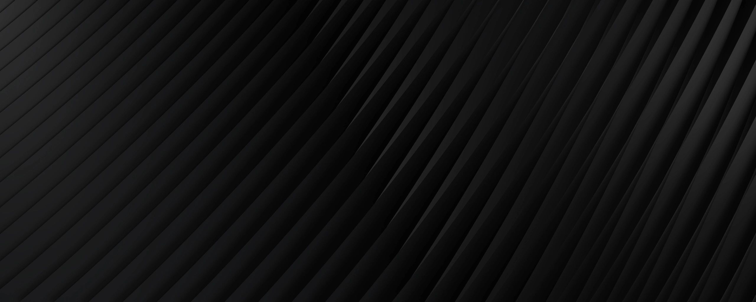 Client posing with a laptop showing the new website.